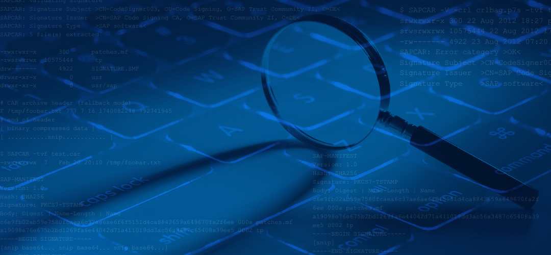 Magnifying glass overlayed on a laptop keyboard.